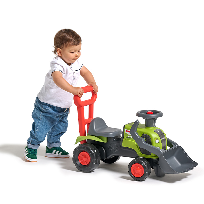 Boy with Ride-on Tractor Claas
